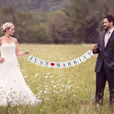 Just married bunting banner flags with ribbon, decoration wedding feast or photo booth photography