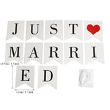 Just married bunting banner flags with ribbon, decoration wedding feast or photo booth photography