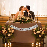 Just married bunting banner flags with ribbon, decoration wedding feast or photo booth photography